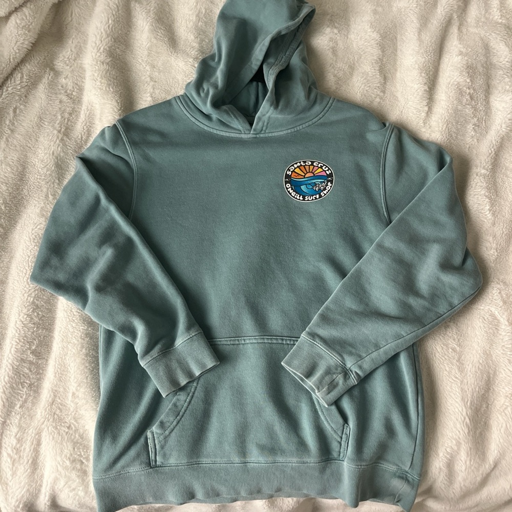 O’Neill teal hoodie with a design on the front and back size youth large